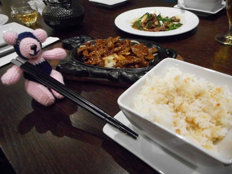 Panda Mick with chopsticks and rice