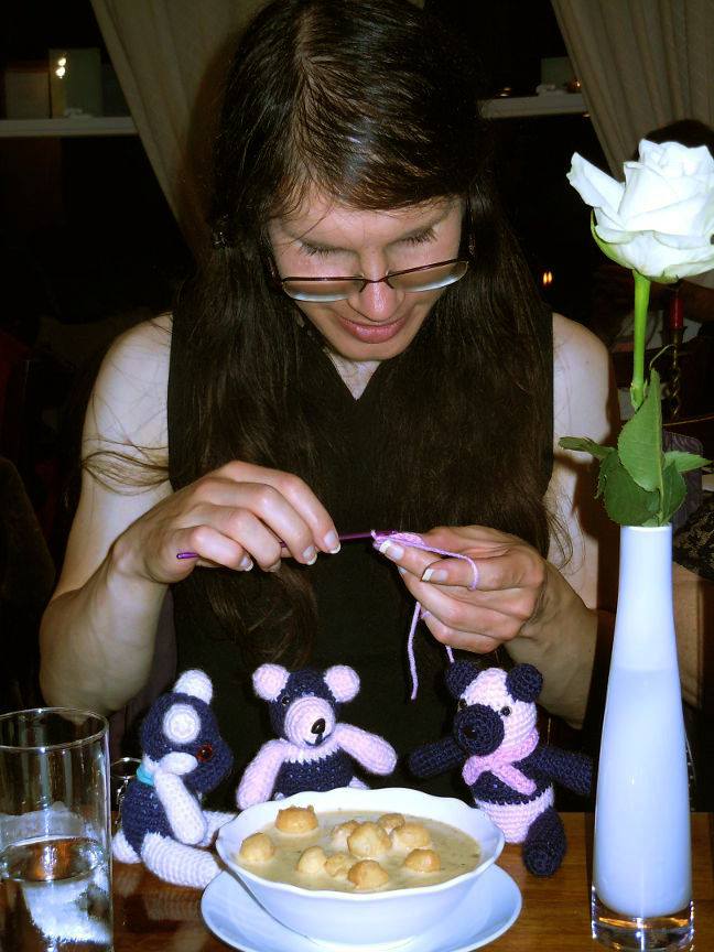 Stephanie crocheting another panda