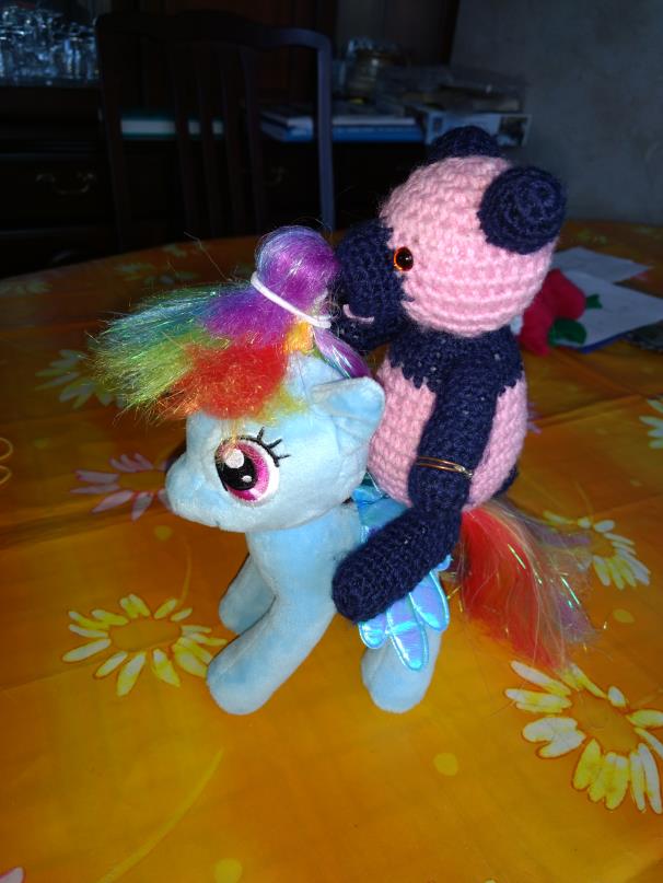 Sam on a rainbow pony